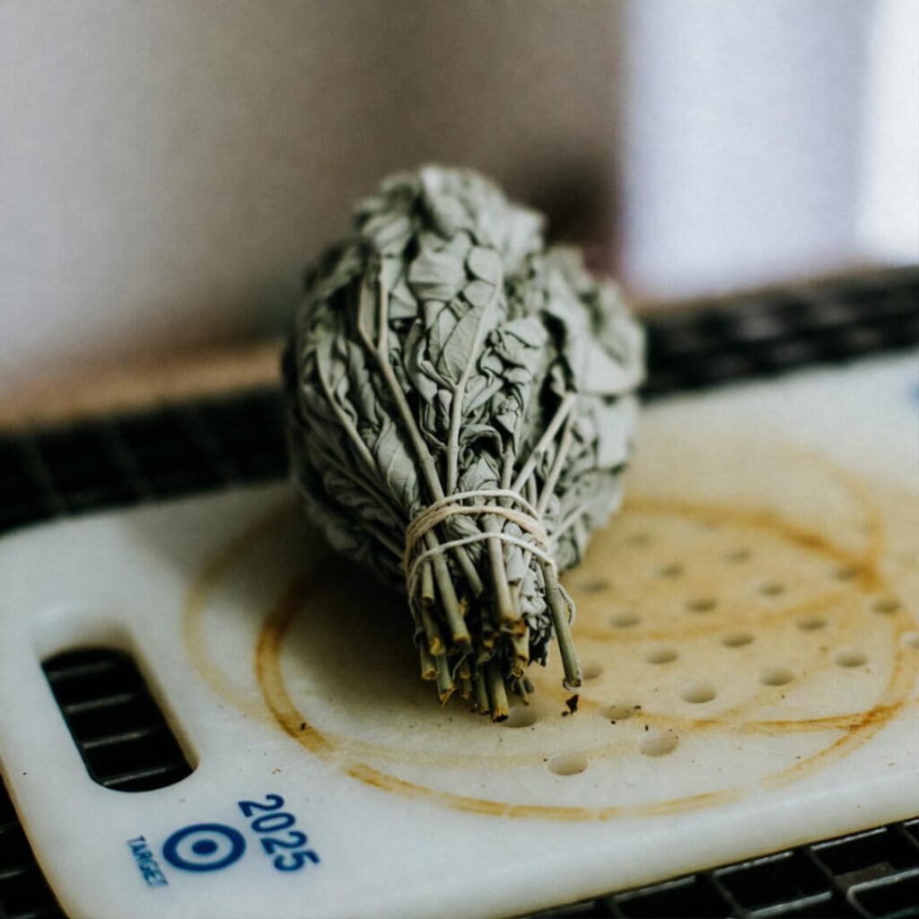 Dusty sage bundle on 2025 Target cutting board, low-angle view